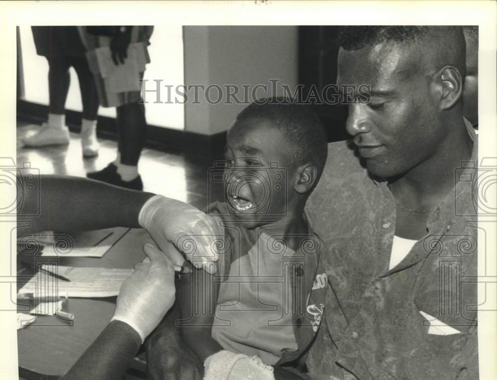 1993 Press Photo James Irving getting immunization shot at The Immuno Fair &#39;93 - Historic Images