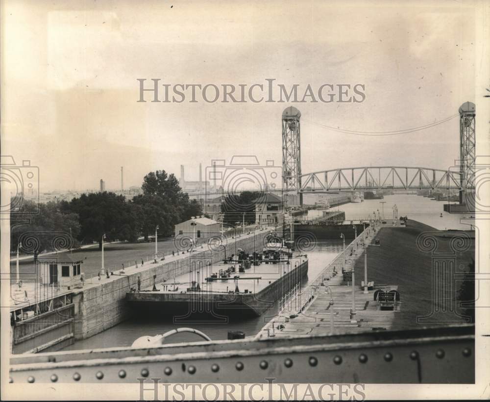 1964 Tugboat Pushes Oil Barge Through Lock on Industrial Canal - Historic Images