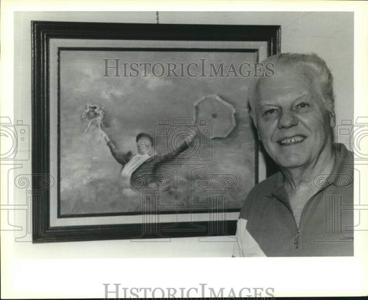 1991 Press Photo Frank Jacques, Mandeville City Hall artist with his painting - Historic Images