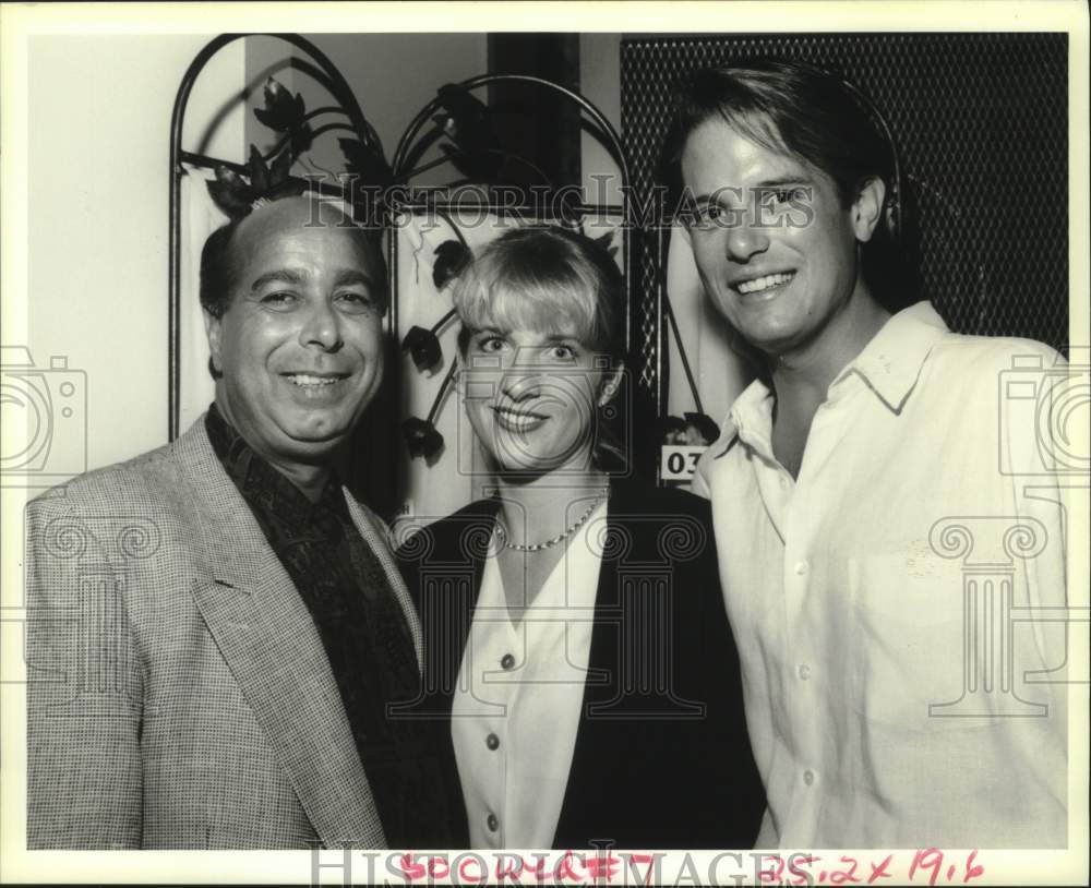 1994 Press Photo Gaylord Burgau, Beth and Chad Harris during Pennies for CA - Historic Images