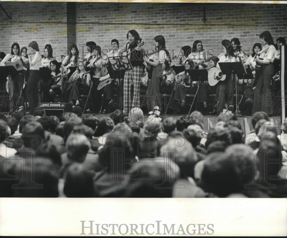 1975 Immaculata group plays for students of Archbishop Shaw. - Historic Images