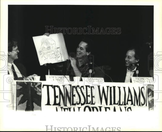 1993 Press Photo Panel moderated by Wendy Wolf on TV sitcoms, displays her art. - Historic Images