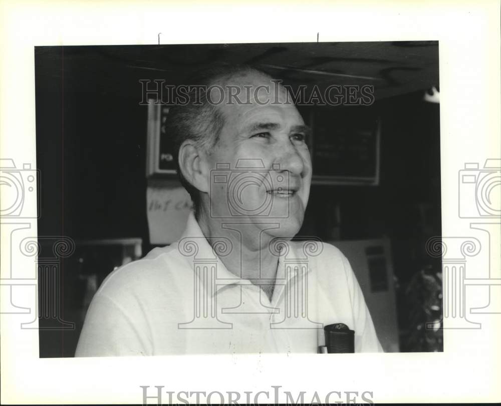 1990 Press Photo Jay Juneau overlooks activities at the Adult League Park - Historic Images