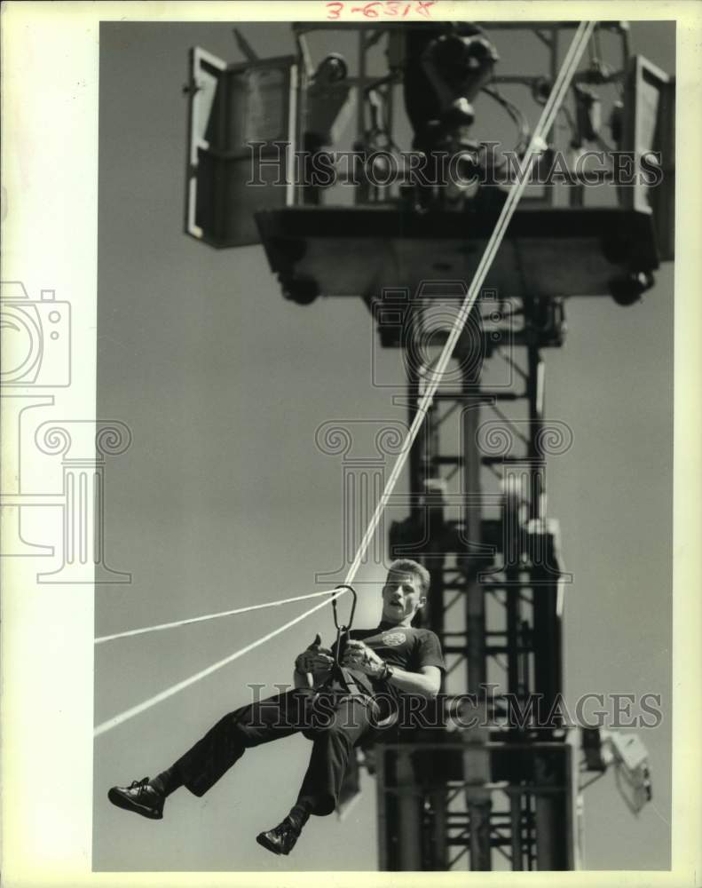 1988 Press Photo Jefferson Parish Fireman Herbert Sclaudecker- "Slide For Life" - Historic Images
