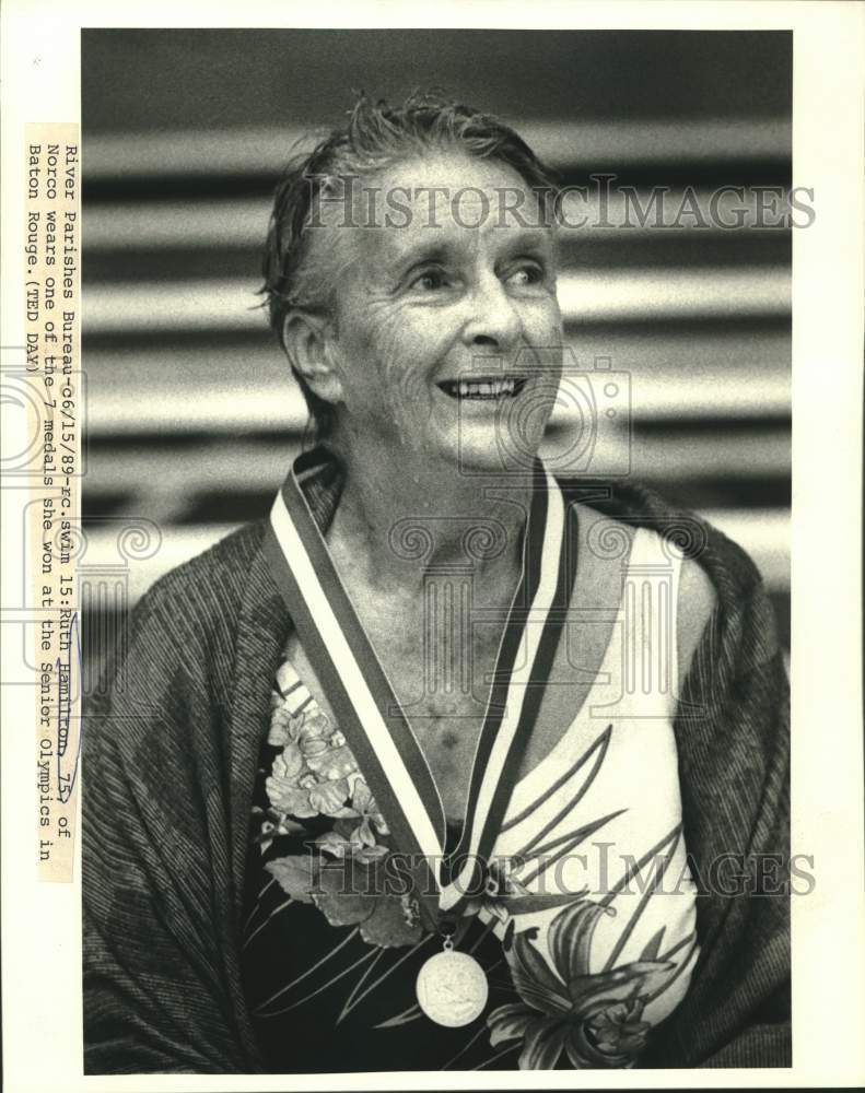 1989 Press Photo Ruth Hamilton wears one of the medal she won at Senior Olympics - Historic Images