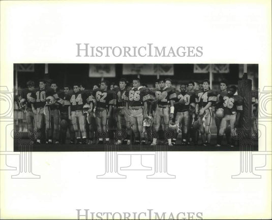 Press Photo Football players during game - Historic Images