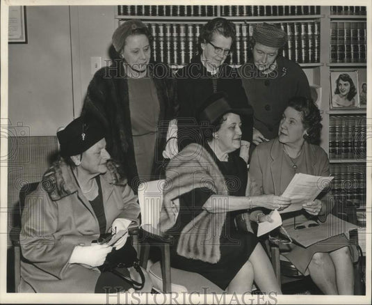 1964 Mrs. J.F. Knoff looks at document-Historic Images