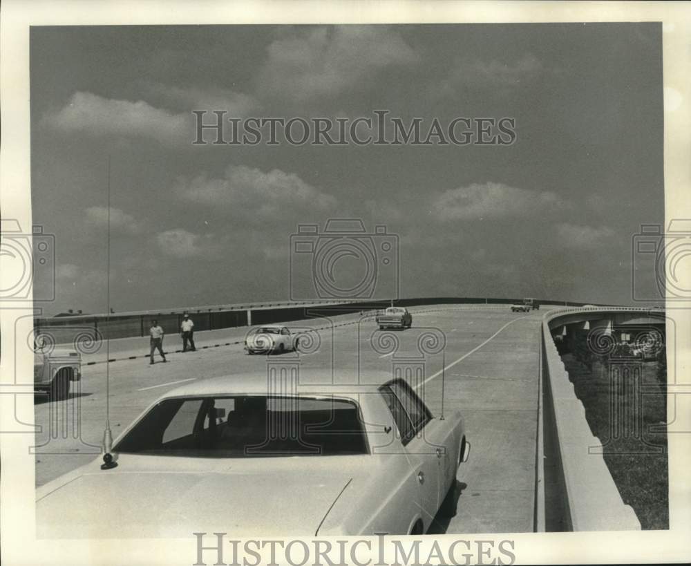 1975 Motorist along Interstate-610 and Bernard Avenue - Historic Images