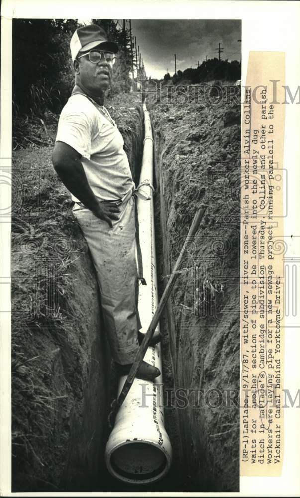 1987 Press Photo Alvin Collins, sewage project- LaPlace&#39;s Cambridge subdivision - Historic Images