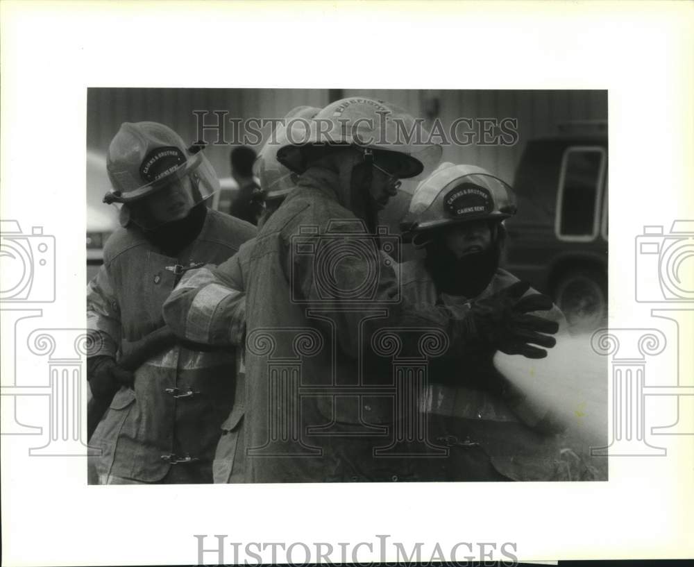 1993 Press Photo Fire Fighter Academy Instructor Shows How To Use A Ho 1993-press-photo-fire-fighter-academy-instructor-shows-how-to-use-a-ho