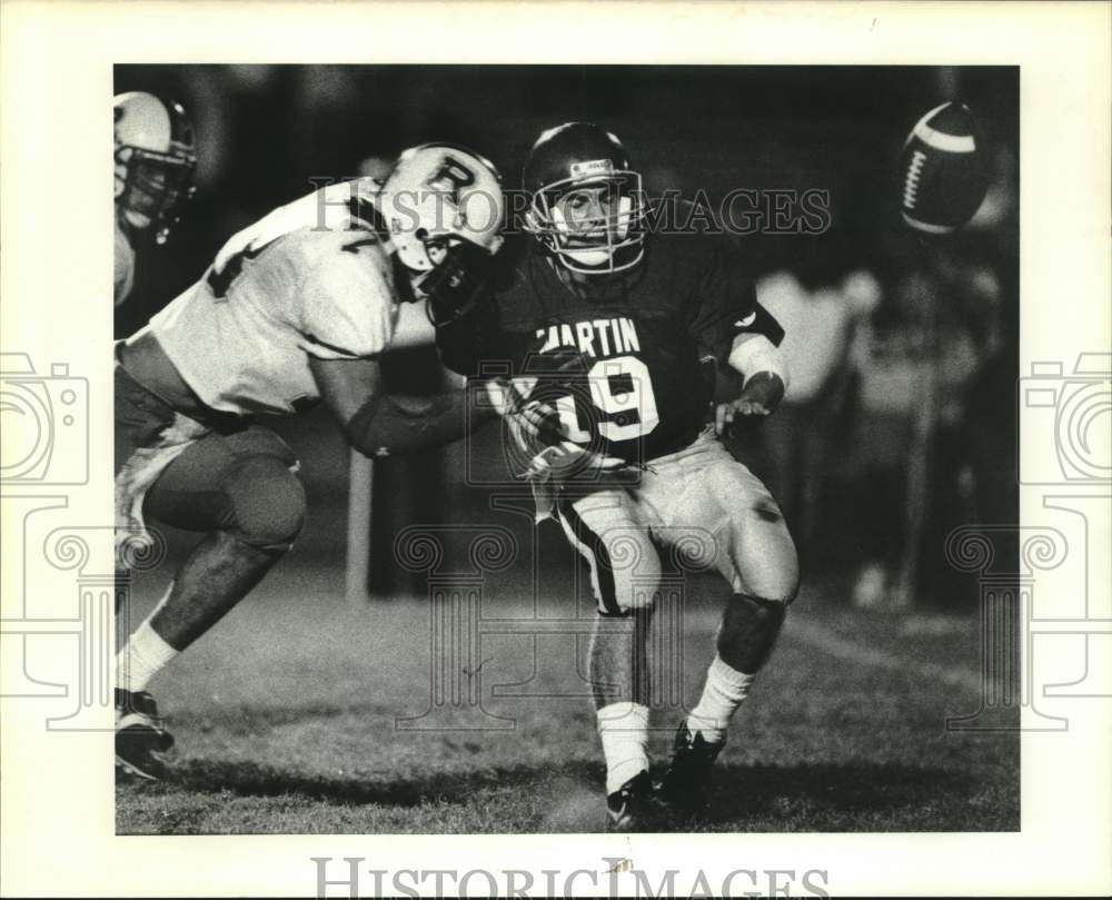 1989 Press Photo Football - Brother Martin&#39;s Chad LaRose gets hit by Marc Milano- Historic Images