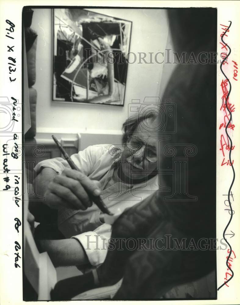 1992 Press Photo Richard Johnson paints a handmade hobby horse for AIDS art show - Historic Images