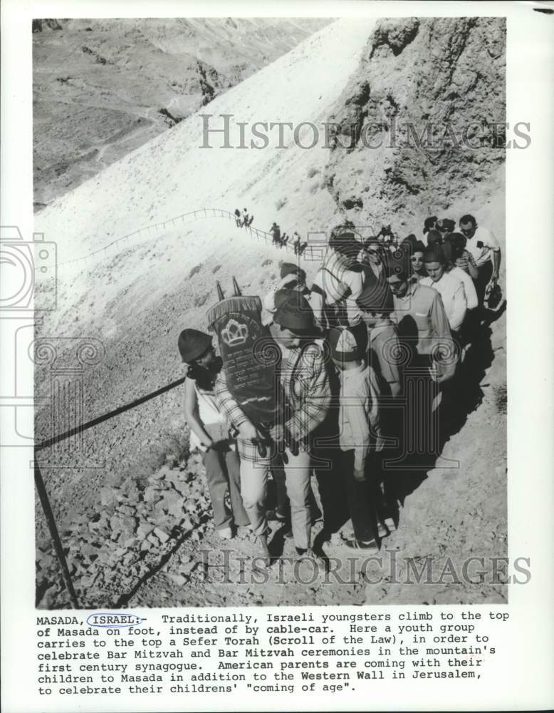 Press Photo Youth group carries to top a Sefer Torah in Masada, Israel - Historic Images
