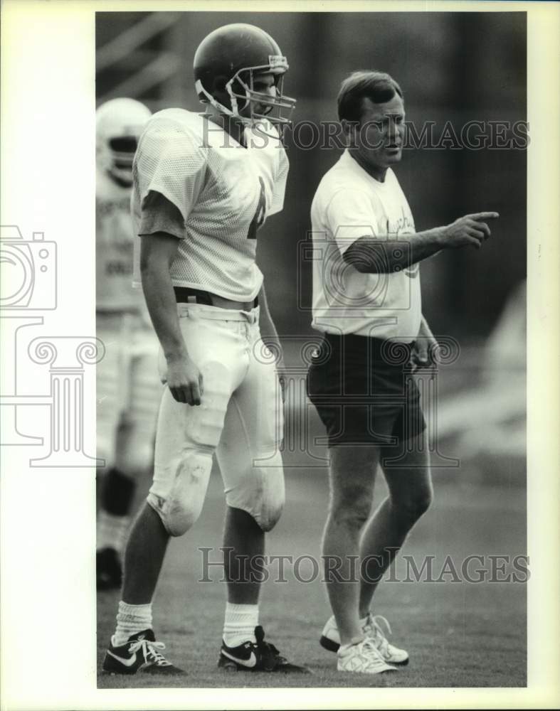 1990 Press Photo Football-Chad Larose listens to LSU east Coach Mike Valley - Historic Images