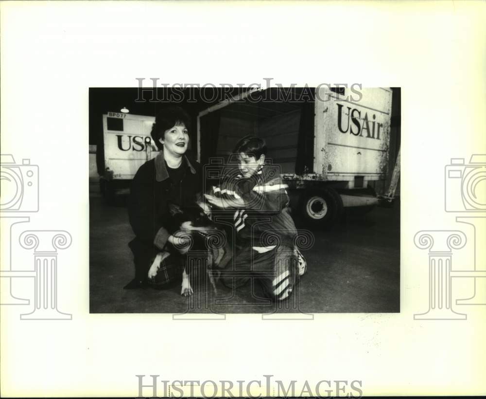 Press Photo Jane LeBlanc and son William with new refugee dog Bobbie - Historic Images