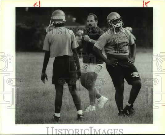 1992 Press Photo Higgins football coach Mark Terrebone works with his linemen - Historic Images
