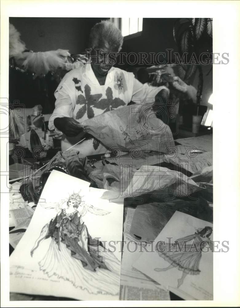 1990 Press Photo Bernice Lewis works on patterns for costumes for Nutcracker. - Historic Images