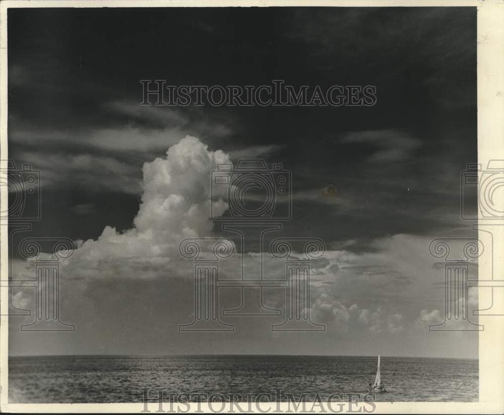 1963 Cumulus clouds grow in size &amp; number. One towers above the rest-Historic Images