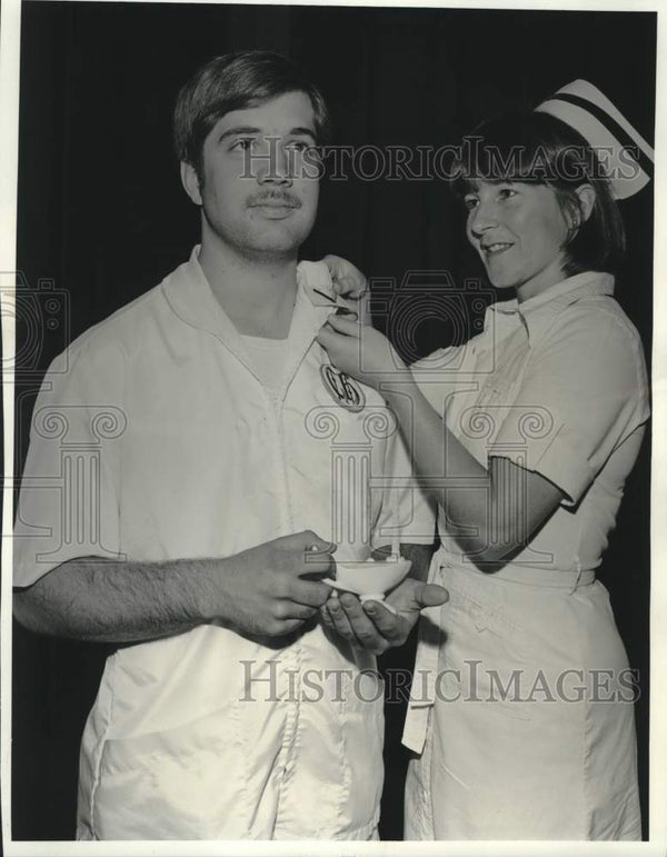 Press Photo Maureen Movius pins the chevron to James Ott of New Orlean ...