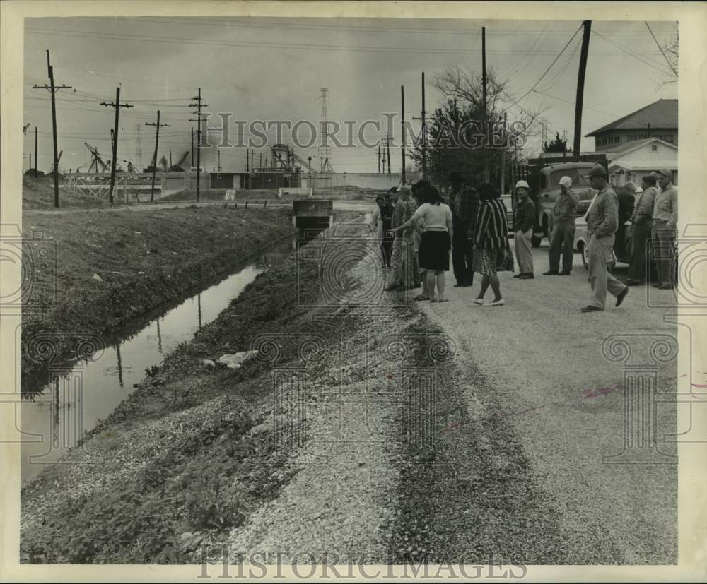 1965 Residents look over Jordan Canal at Law Street - Historic Images