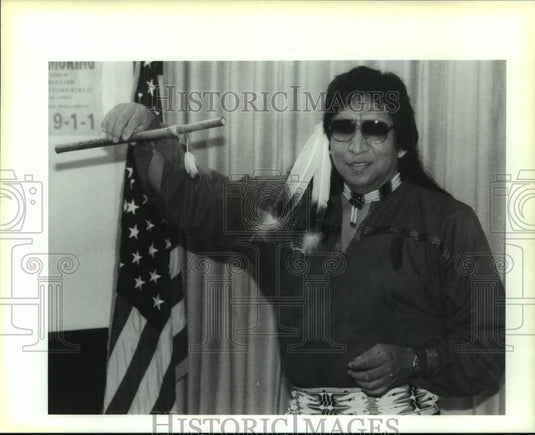 1995 Press Photo Bert Langley holding an "Indian Flute" at the Chalmette Library - Historic Images