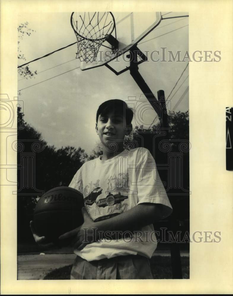 1991 Raymond Langlois, Basketball player at Little Farms Playground - Historic Images