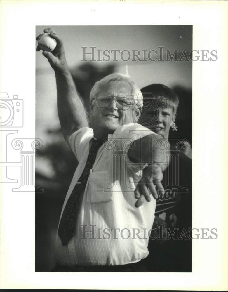 1992 Press Photo Parish counsel Arnald Labat throws seasons first pitch - Historic Images