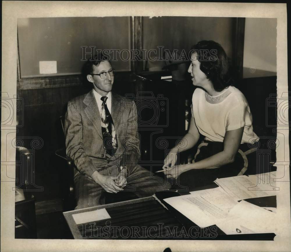 1954 Bank Manager Edward W. Kolb talking with Clerk Thelma Daniel-Historic Images