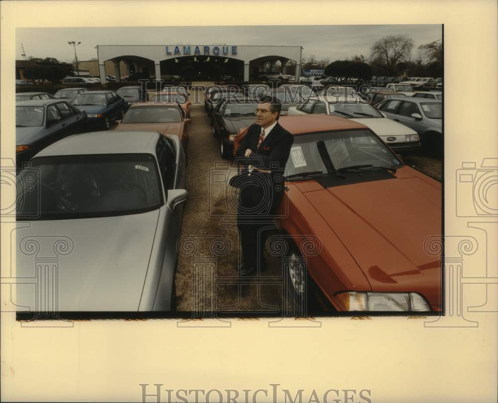 1995 Press Photo Ronnie Lamarque at his car dealer shop - Historic Images