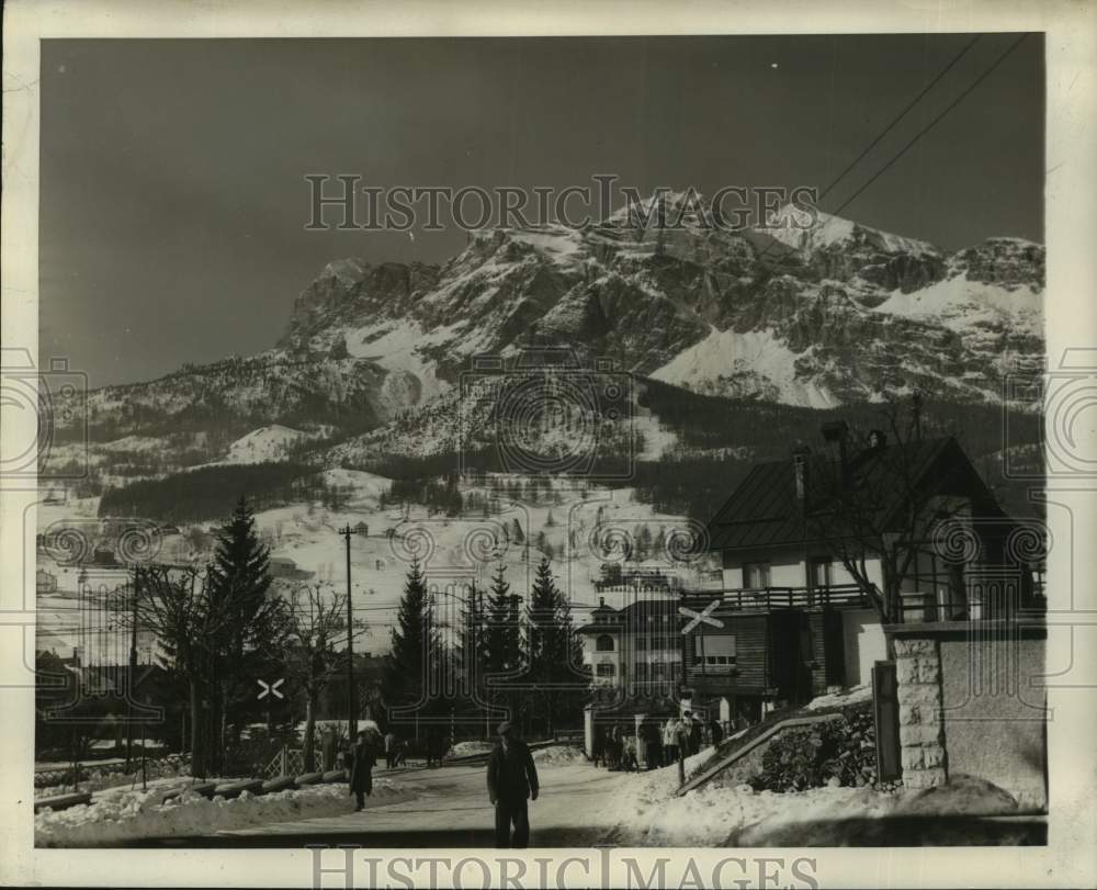 Scenic view of Italian town with mountains in background - Historic Images