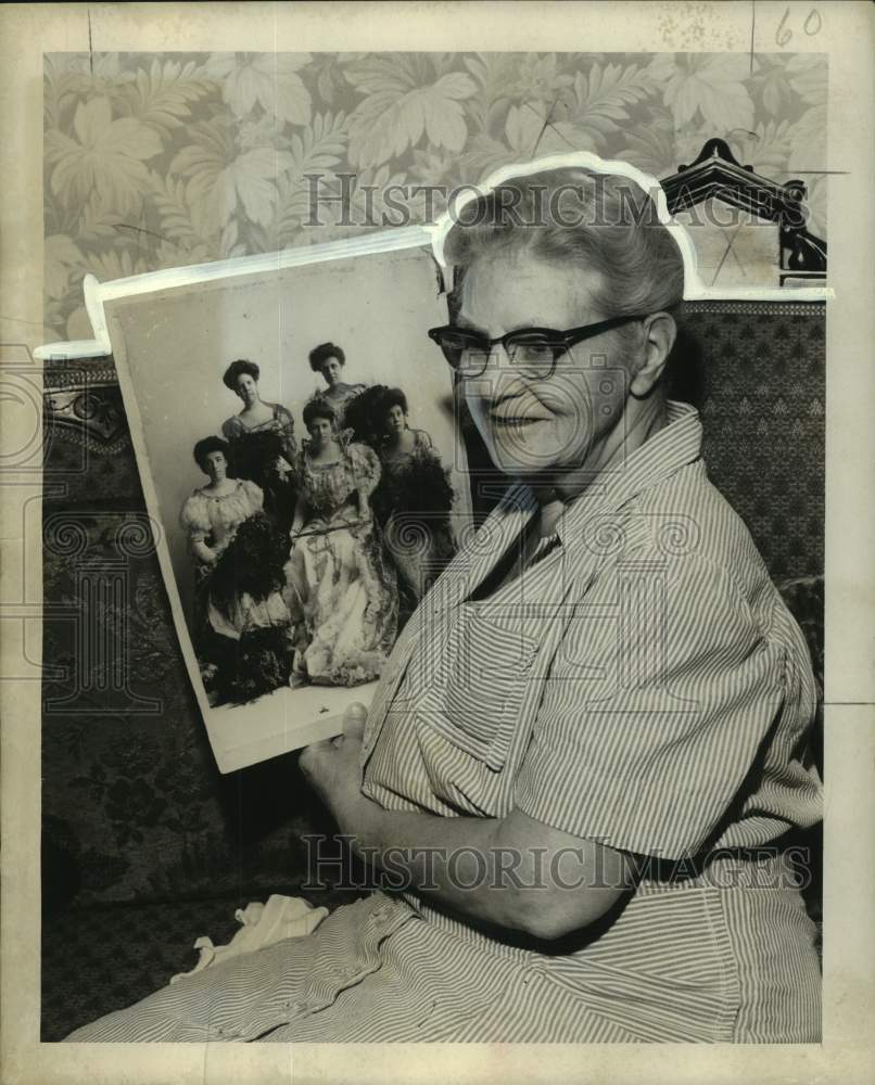 Press Photo Miss Celeste Janvier shows photo when she was a Queen of Comus - Historic Images