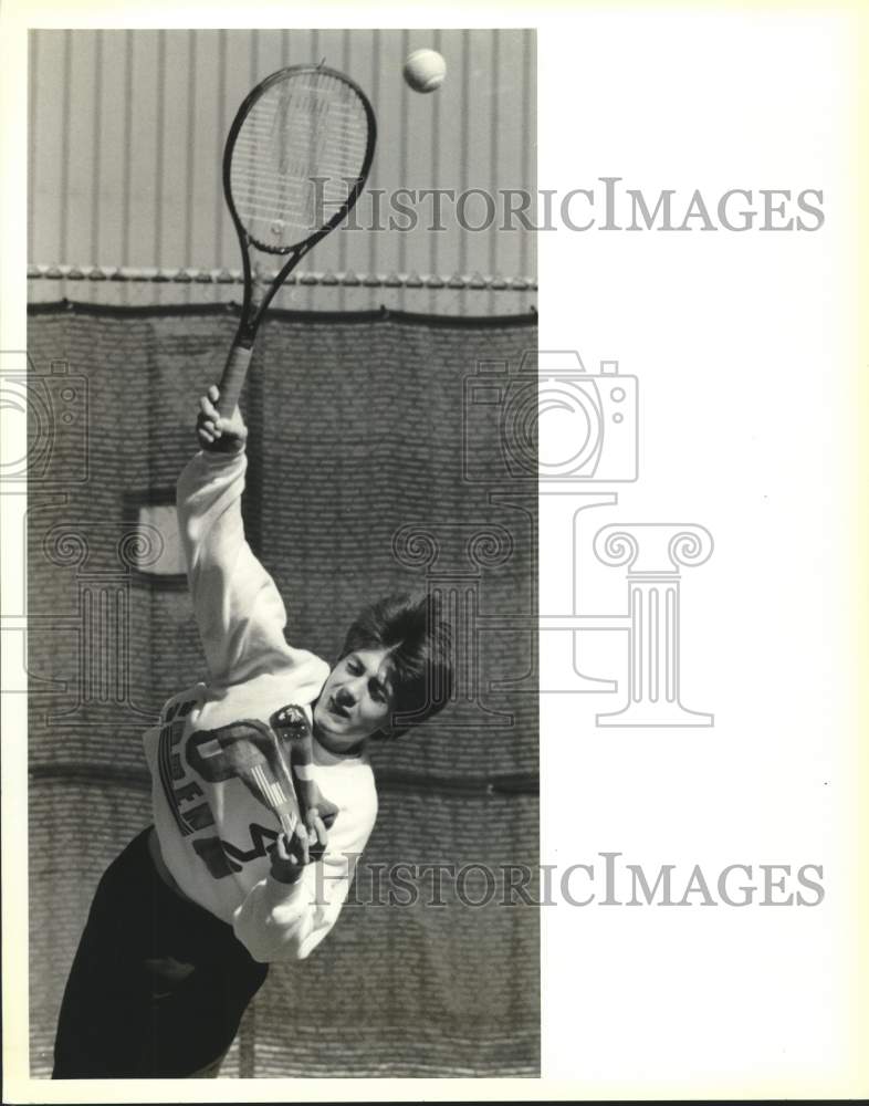 1991 Press Photo Jonathan Massicot practices his serve - Historic Images