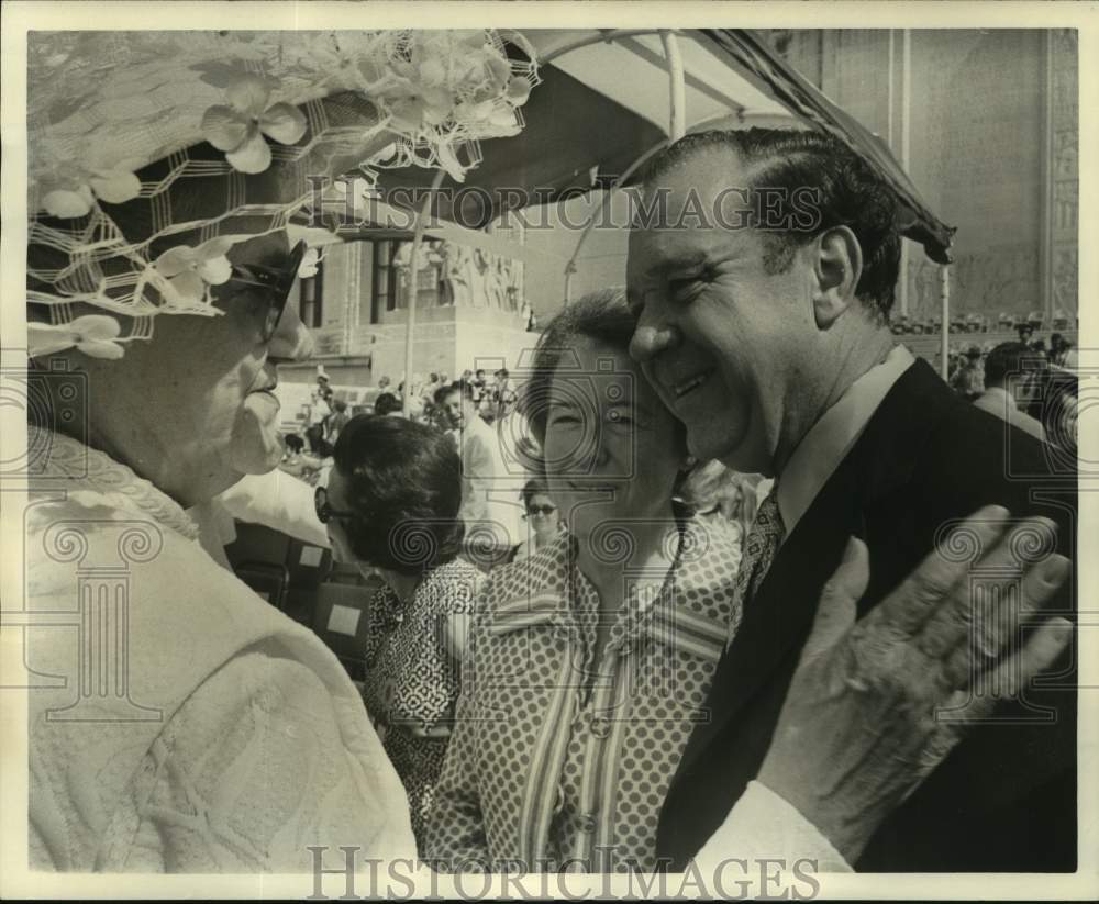 1972 Smiling Senator Long on hand at an outdoor event - Historic Images