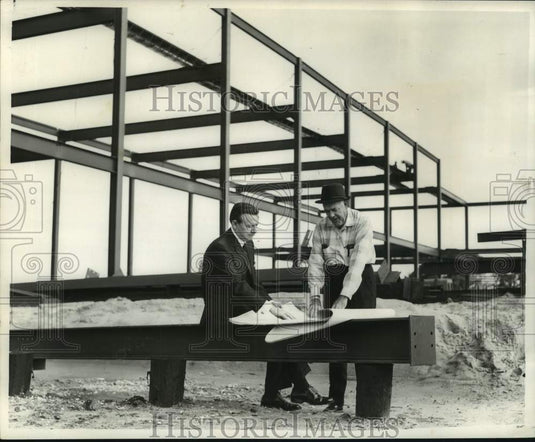 1967 Dr. Homer Hitt conferring with architect of school's expansion-Historic Images