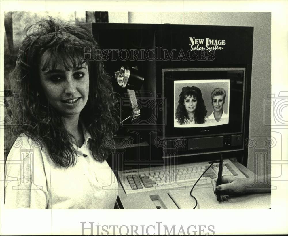 Robin Madere shows high-tech approach to a haircut. - Historic Images