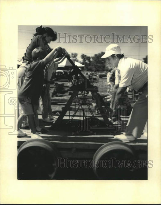1992 Press Photo Lumber Festival goers take a trip on an old Rail Road pump cart - Historic Images