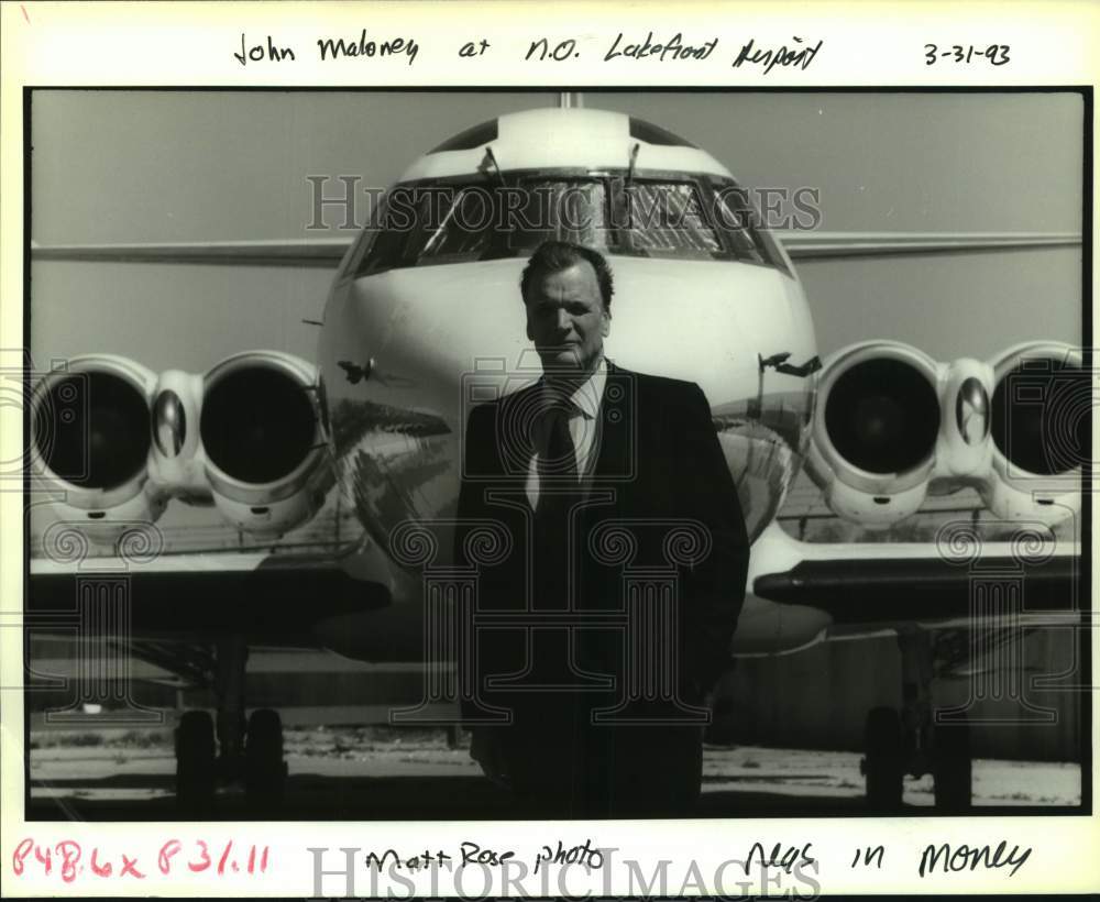 1993 Press Photo John Malony with Greg Norman&#39;s private jet at Lakefront Airport - Historic Images