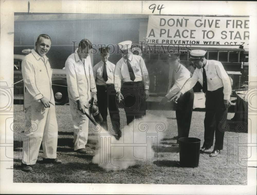 1956 Press Photo Kidde Sales & Services Inc. demonstrate Kidde CO2 extinguisher-Historic Images