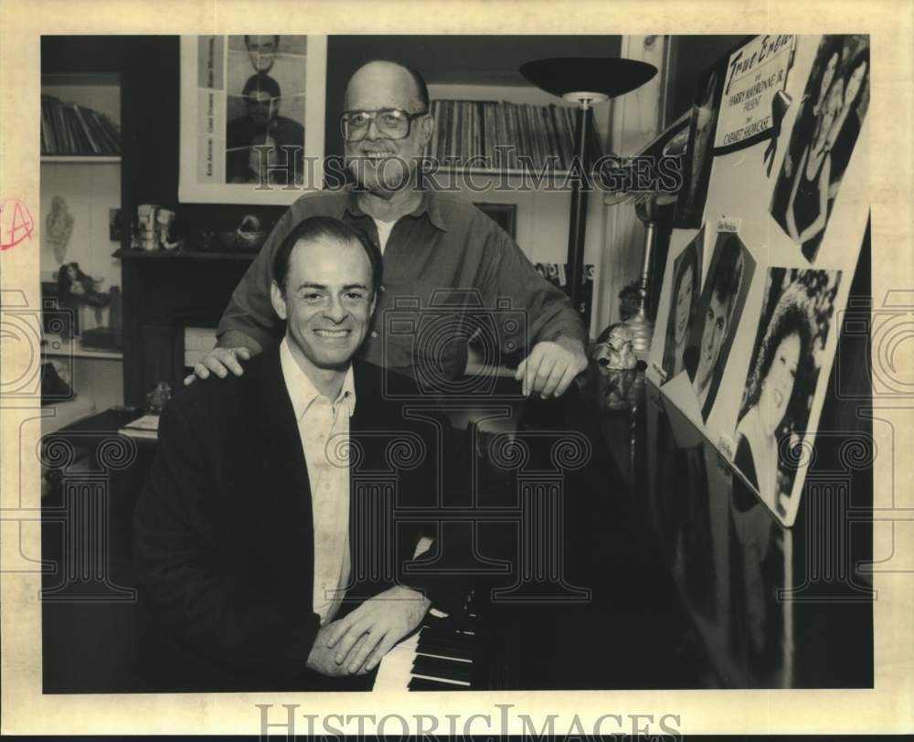 1994 Press Photo Harry Mayronne Jr. and Sr. stand in son Harry&#39;s livingroom - Historic Images