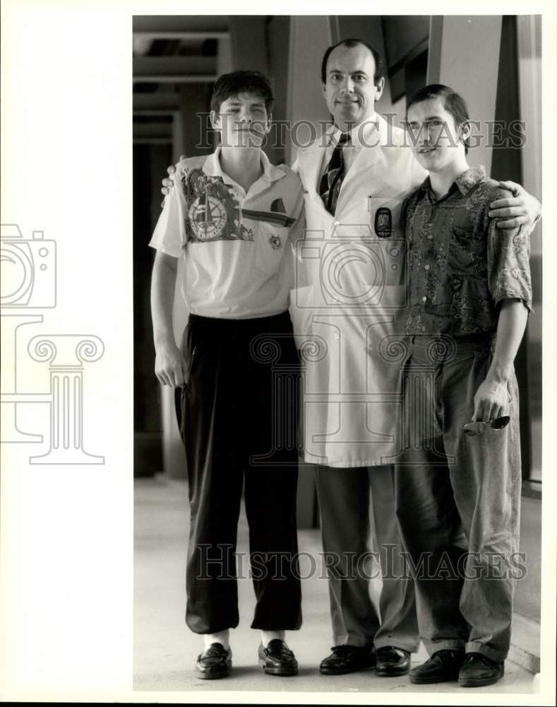 1993 Press Photo Dr. Bruce Barron, LSU Eye Canter, Treated Blind Siberian Boys - Historic Images