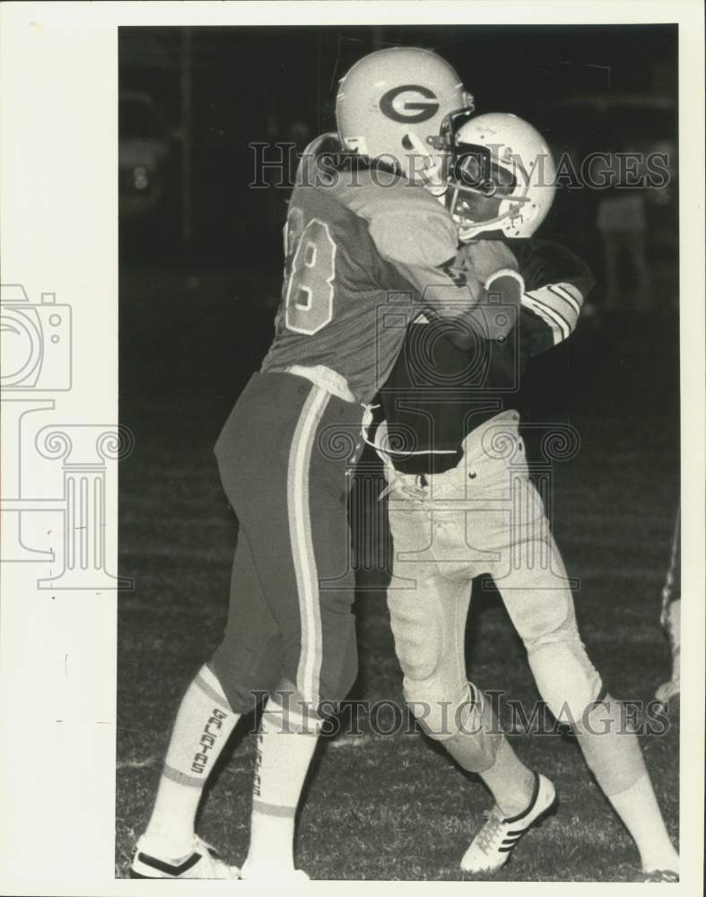 1984 Press Photo Football - Michele McCoy blocks her man and stops him dead- Historic Images