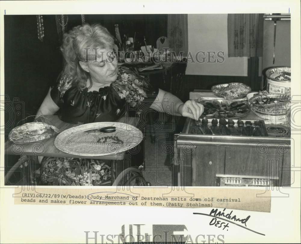 1989 Judy Marchand melts beads to make flower arrangement, Destrehan - Historic Images