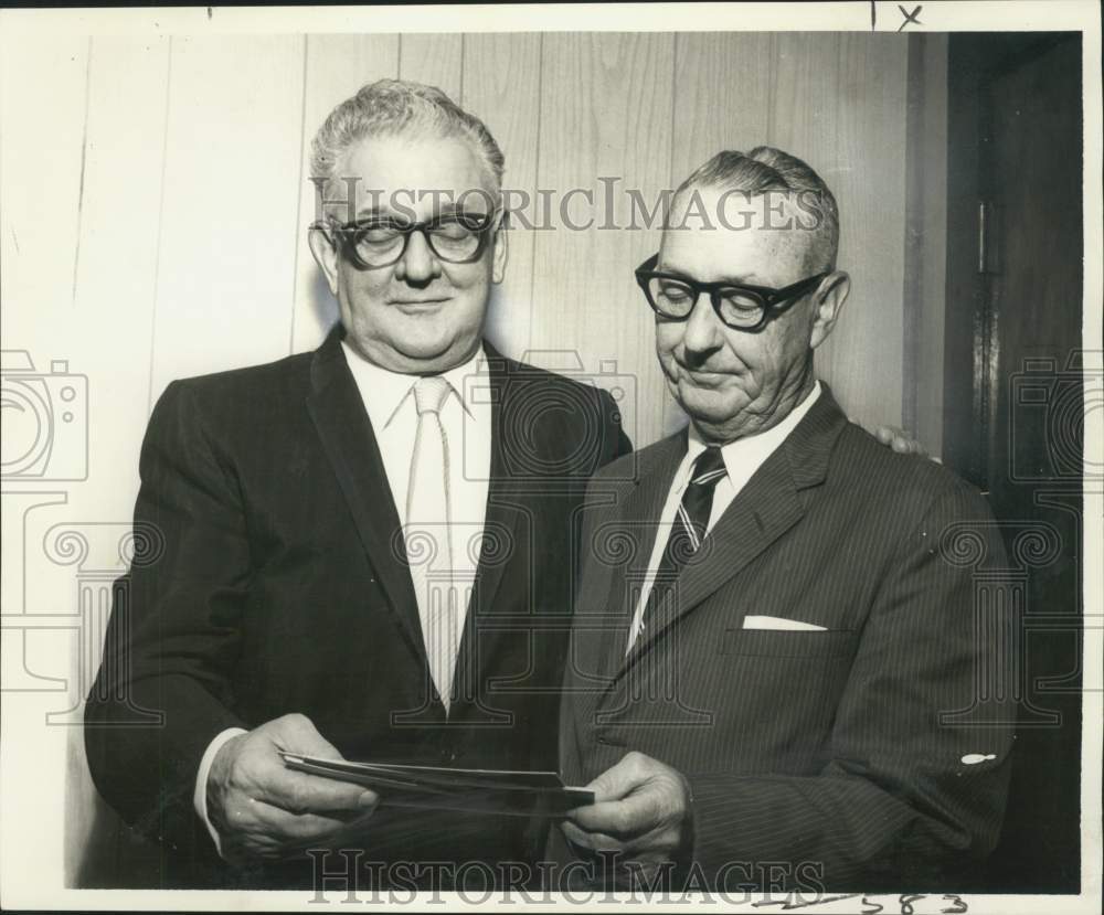 1965 Press Photo Irwin Poche receives check from Francis McCarthy-Kid Grid Fund-Historic Images