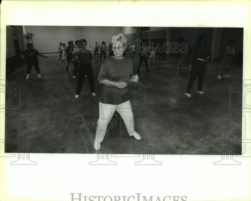 Participants in Price of Peace Catholic Church&#39;s line dancing class - Historic Images