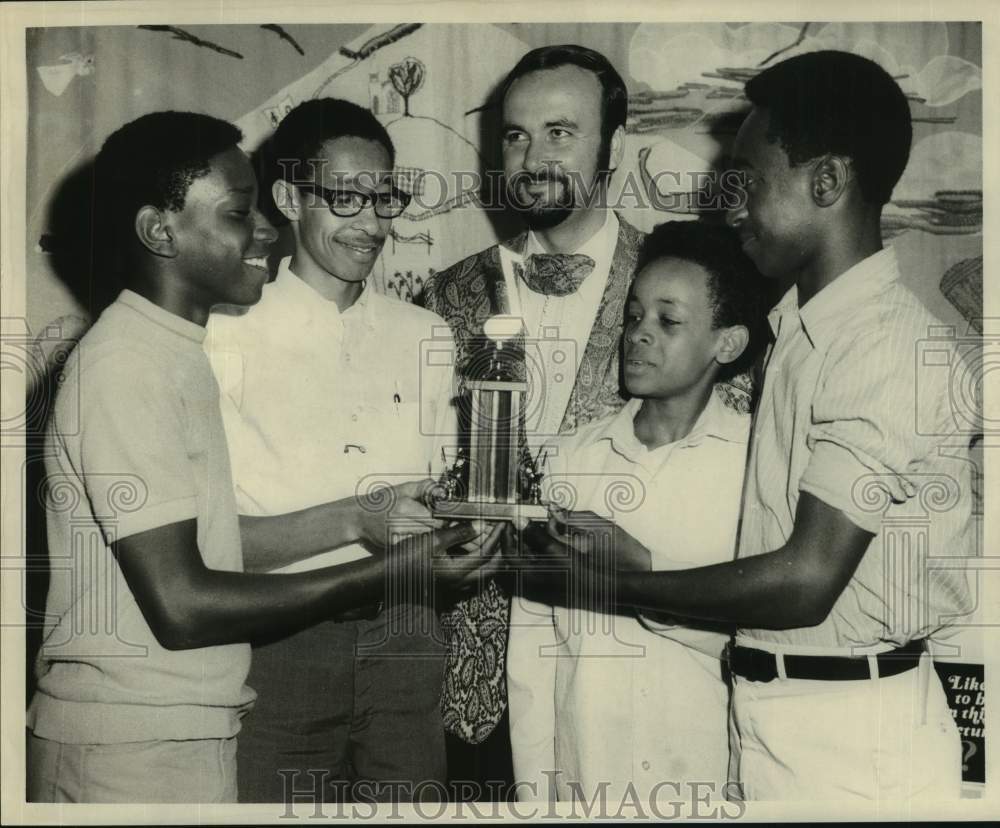 1970 L.B. Landry Jazz Band holding their trophy - Historic Images