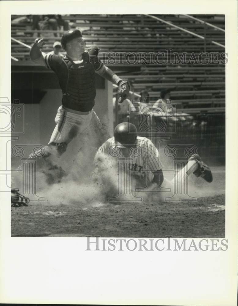 1988 Press Photo Jesuit Player Slides Into Home In Acadiana Game, Baton Rouge - Historic Images