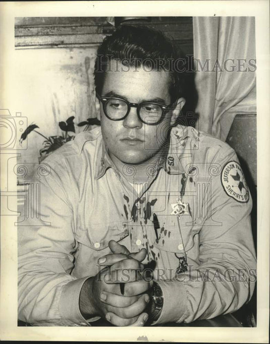 1965 Deputy Sheriff William Miller at 2nd and Avenue Aswego-Historic Images