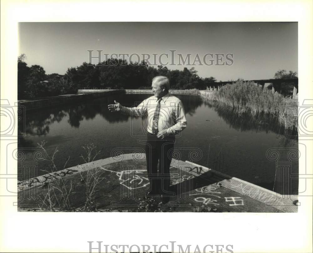 1995 David Michiels stands next to Lincoln Beach&#39;s swimming pool - Historic Images