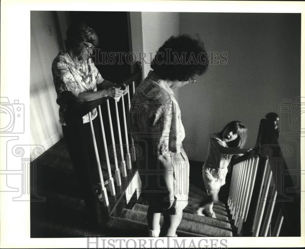 1994 Lauren Orgeron Explains Banister-Sliding To Mom, Grandmother - Historic Images