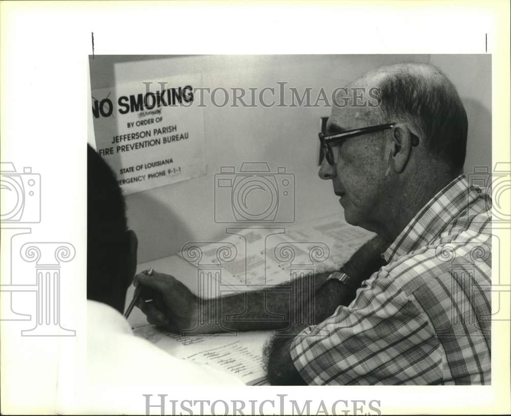 1990 Tutor Assists Adult Student At Operation Mainstream Session - Historic Images